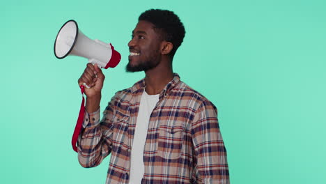 Smiling-bearded-man-talking-with-megaphone,-proclaiming-news,-loudly-announcing-sale-advertisement