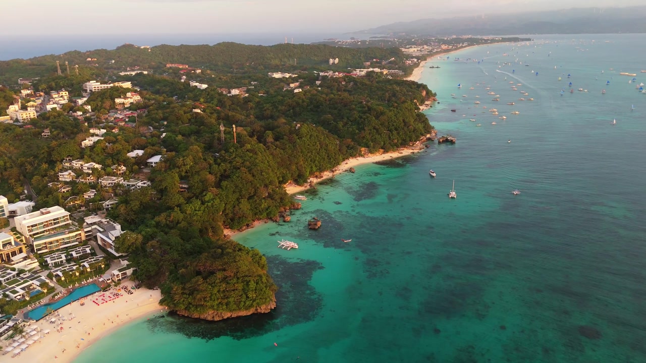 Aerial sunset white angle view of island top destination world famous Beach in Boracay, Philippines Asia