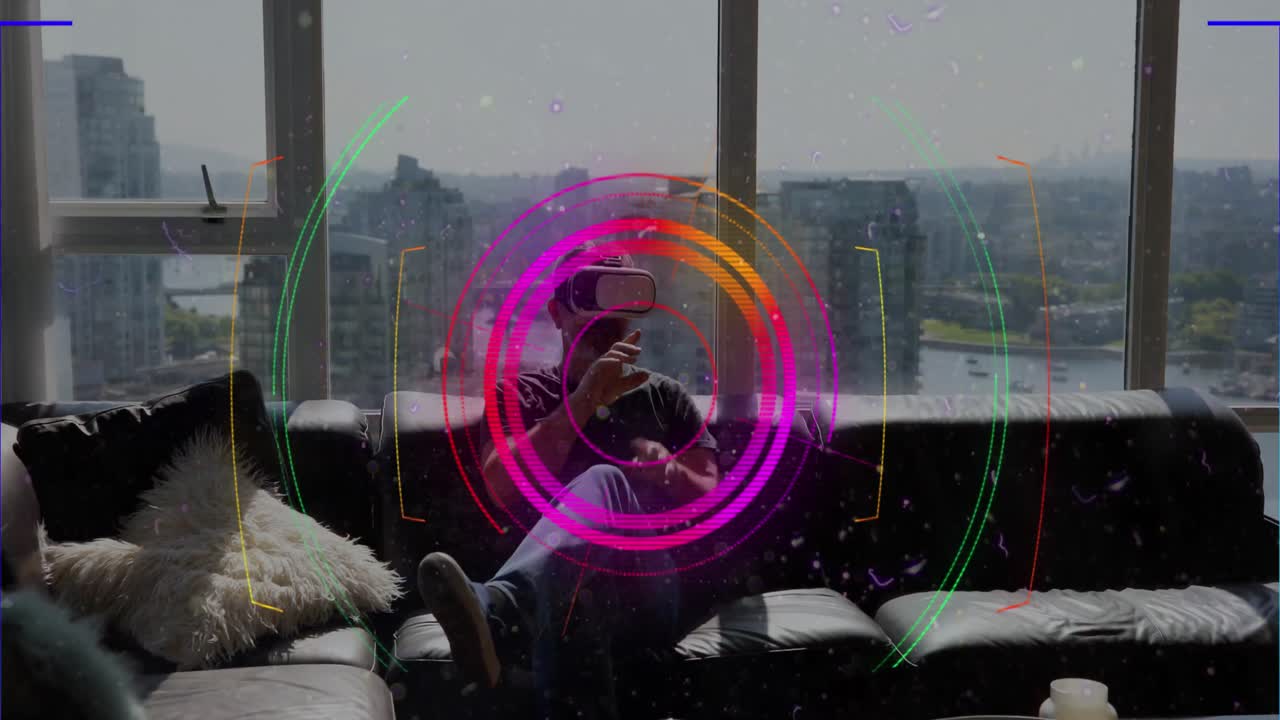 Colorful light trails and scope scanning over caucasian man gesturing while wearing vr headset