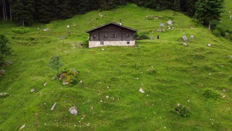 aerial fly by of an alpine farmhouse in austria stock almhütte lofer