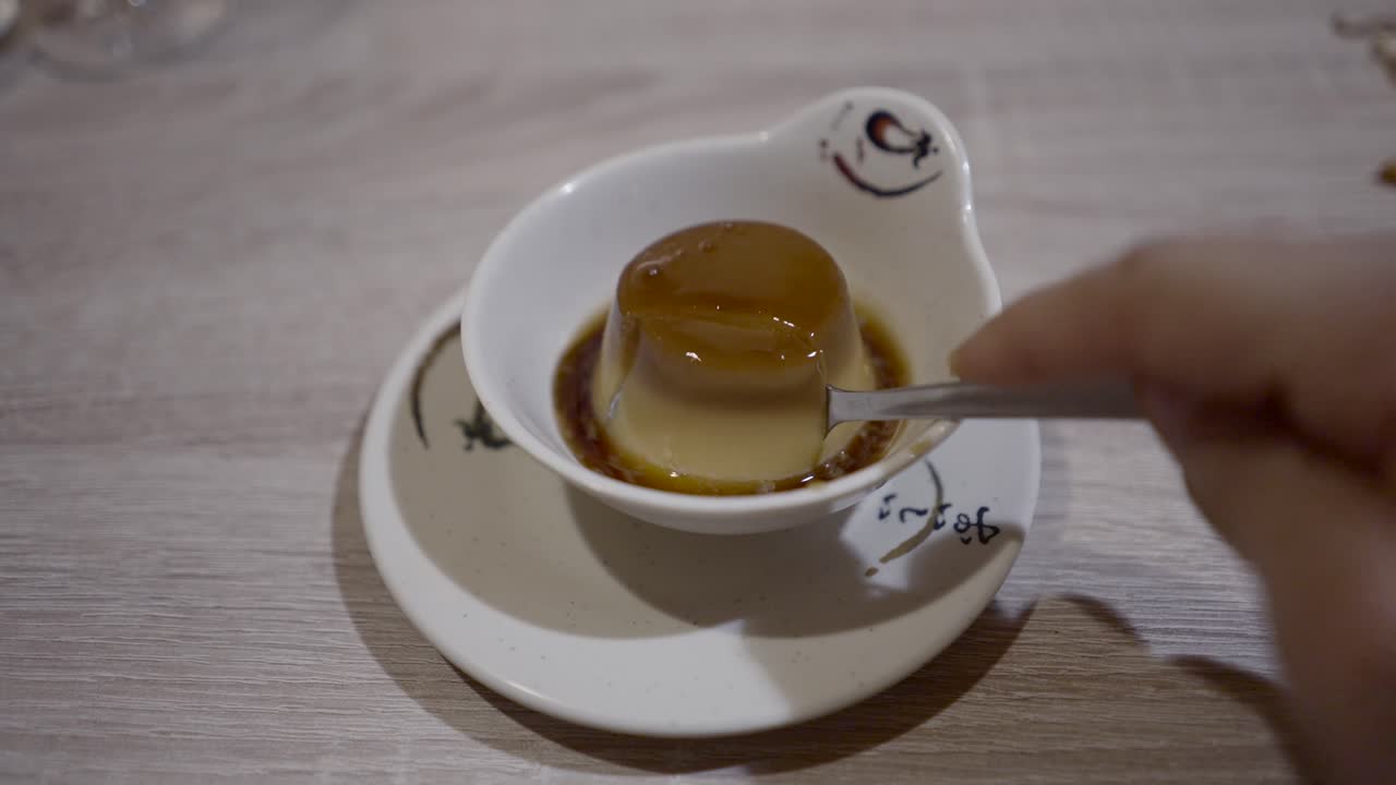 Person eating a dessert