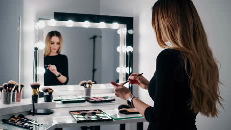 makeup artist at work in a studio