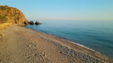 drone flying around the beaches of nerja, spain