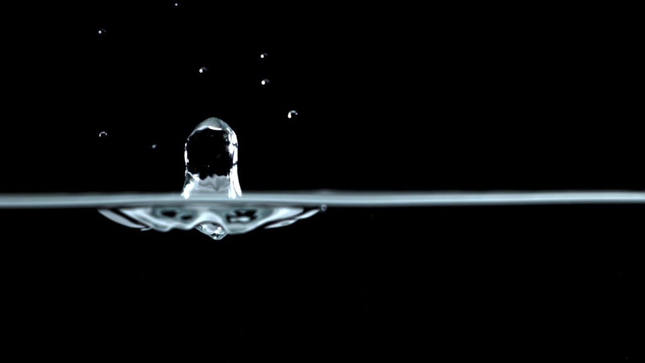 Single Water Drop Falling and Splashing in Slow Motion
