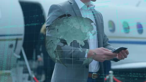 animation of rotating globe and data processing, over businessman using smartphone beside aeroplane