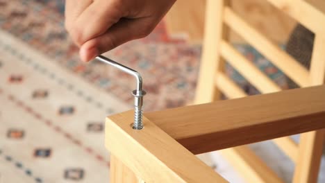 assembling a wooden crib