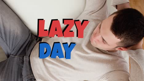 animation of lazy day text over caucasian man lying