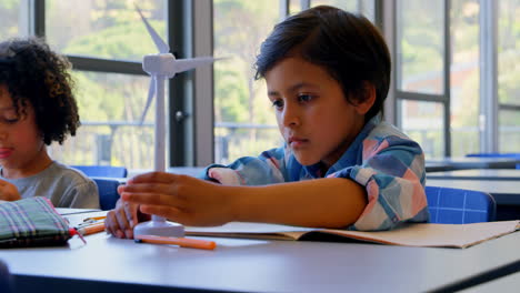 schoolkids studying at desk in the classroom at school 4k