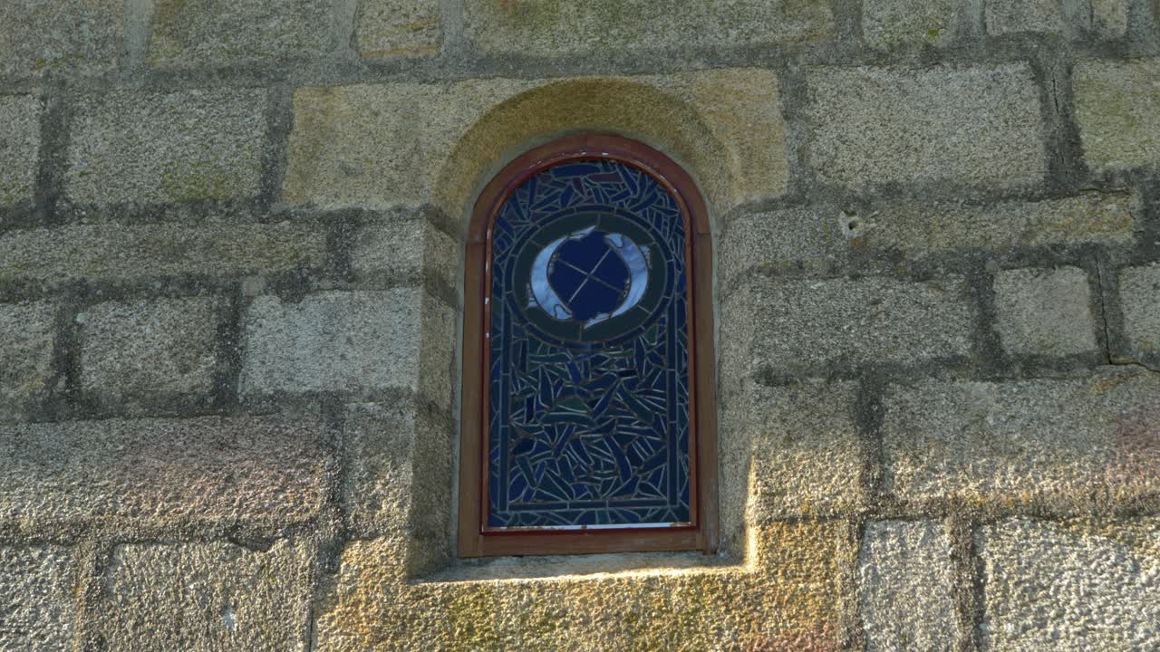 Close-up of stone window at Santa María de Parada de Outeiro church, Vilar de Santos, Spain