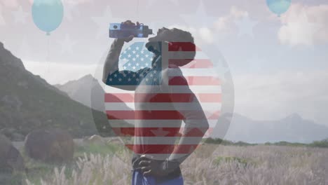 Animation-of-american-flag-over-african-american-man-drinking-water-in-mountains