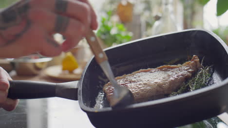 basting steak with butter during cooking