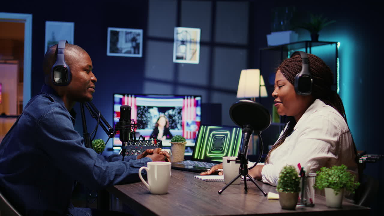 Online show host listening to guest opinion on current events during live broadcast