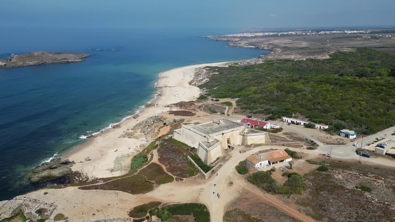 Aerial orbits Fort of Pessegueiro on coast of Portugal near Porto Covo