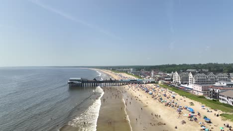 drone shot of the boardwalk at old orchard beach in maine