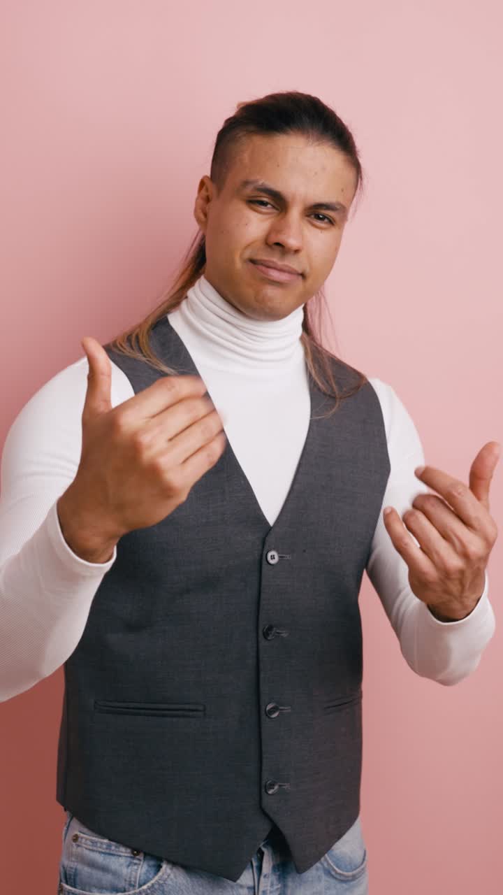 Man Winking and Making an Inviting Gesture