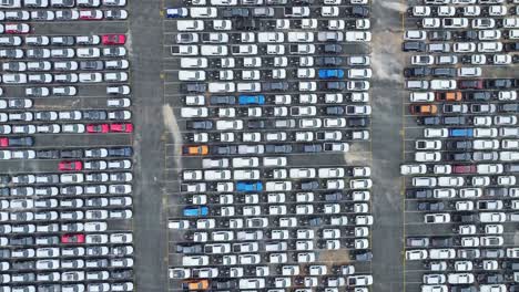aerial view of stored cars at an outside facility at port kembla in australia