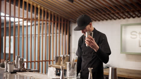 bartender making cocktails at a bar