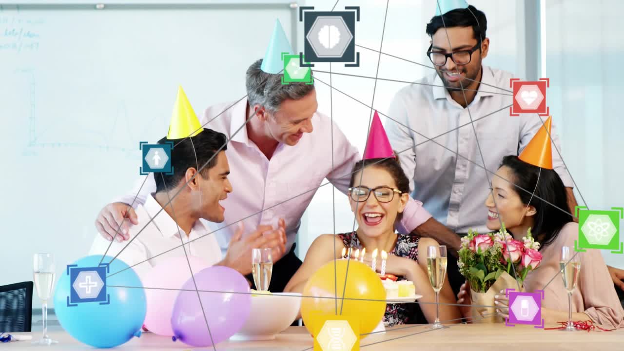 Office team celebrating birthday, candles lighting initiating AR icons connecting colleagues and c