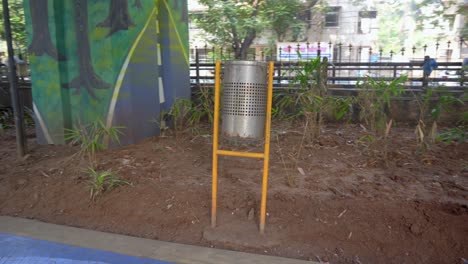 dustbin in a garden bottom of flyover bridge closeup view