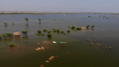 Aerial-View-Of-Large-Swathes-Of-Land-Under-Flood-Water-In-Jacobabad,-Pakistan