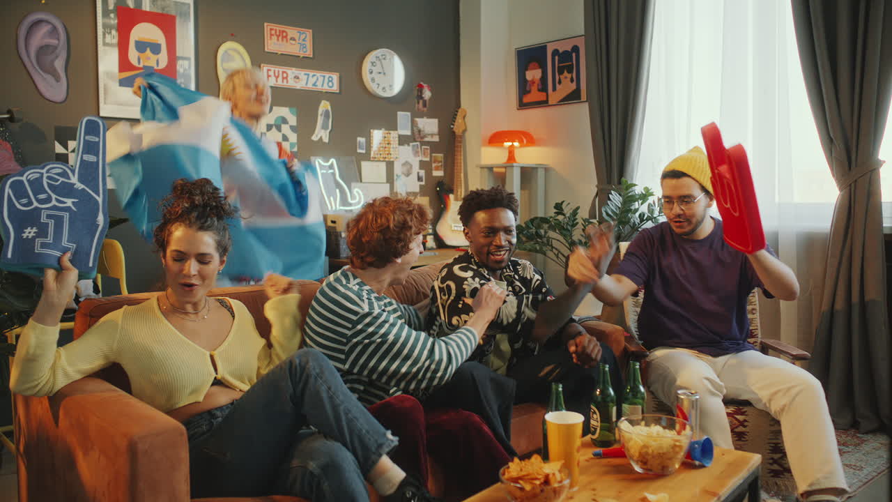 Excited Friends Watching Soccer on TV at Home, Cheering with Argentina Flag