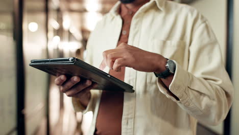 man using tablet in office