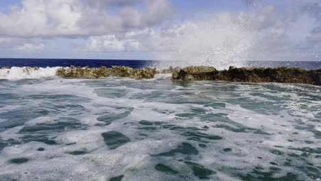 pan shot of blow hole, tinian island