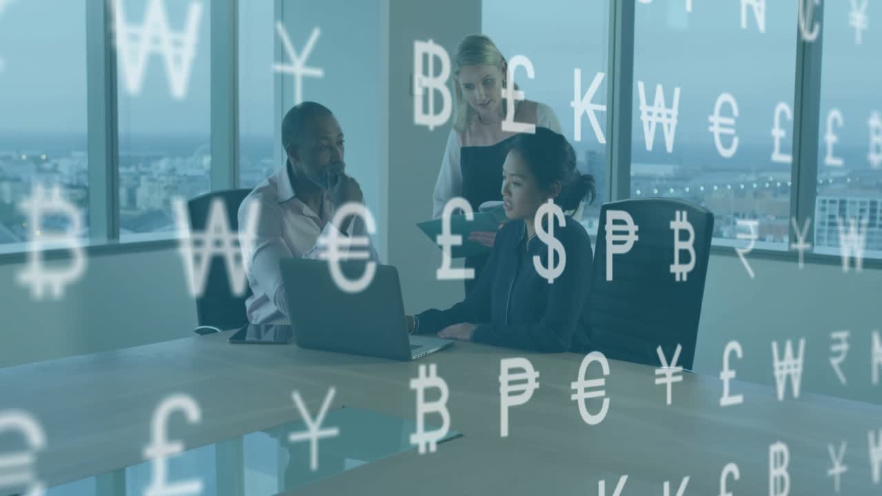 Finance team inputting data on laptop and causing currency symbols drifting in conference room