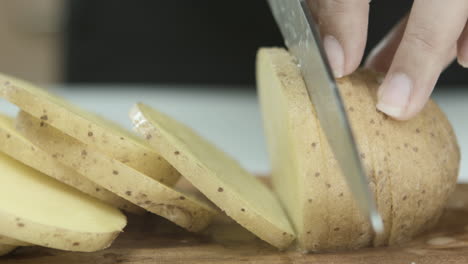 Close-up-of-Potato-Being-Sliced