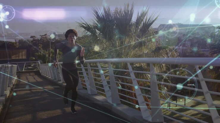 Runner switching from jogging to sprinting on bridge by palms with network overlay connecting nodes