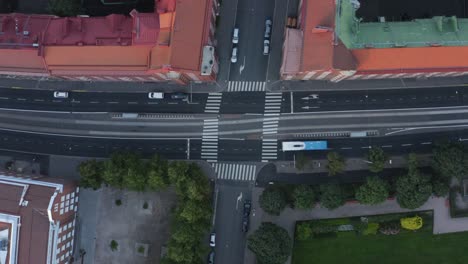 helsinki quiet street from above with bus passing and treetops