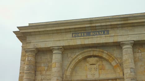 Close-up-shot-of-old-historic-structure,-Porte-Royale-in-La-Rochelle,-France-on-a-sunny-day