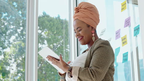 Laughing,-black-woman-and-tablet-of-a-business