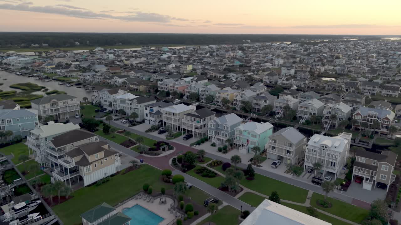 aerial push in over homes at ocean isle beach nc, north carolina