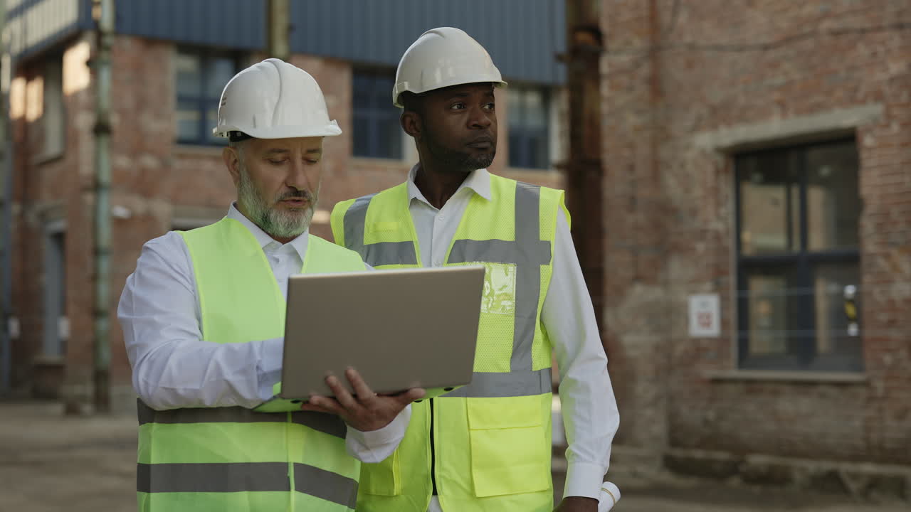 Construction Engineers Reviewing Plans