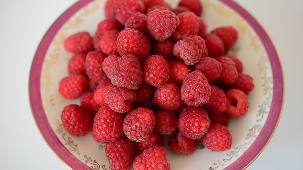Shooting of raspberry. Summer berries