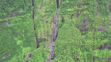 Aerial-view-over-the-Takamaka-waterfalls-on-the-Marsouins-River,-Reunion-Island