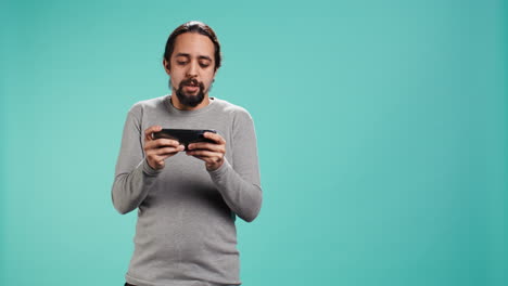 gamer participates in gaming competition using mobile phone