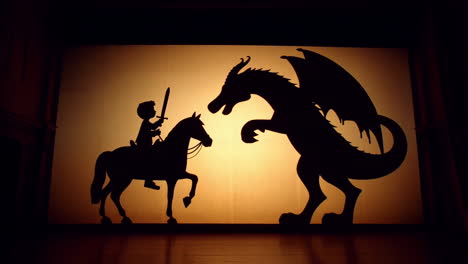 shadow puppet play of a knight and dragon