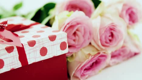 gift box with bunch of rose on white background