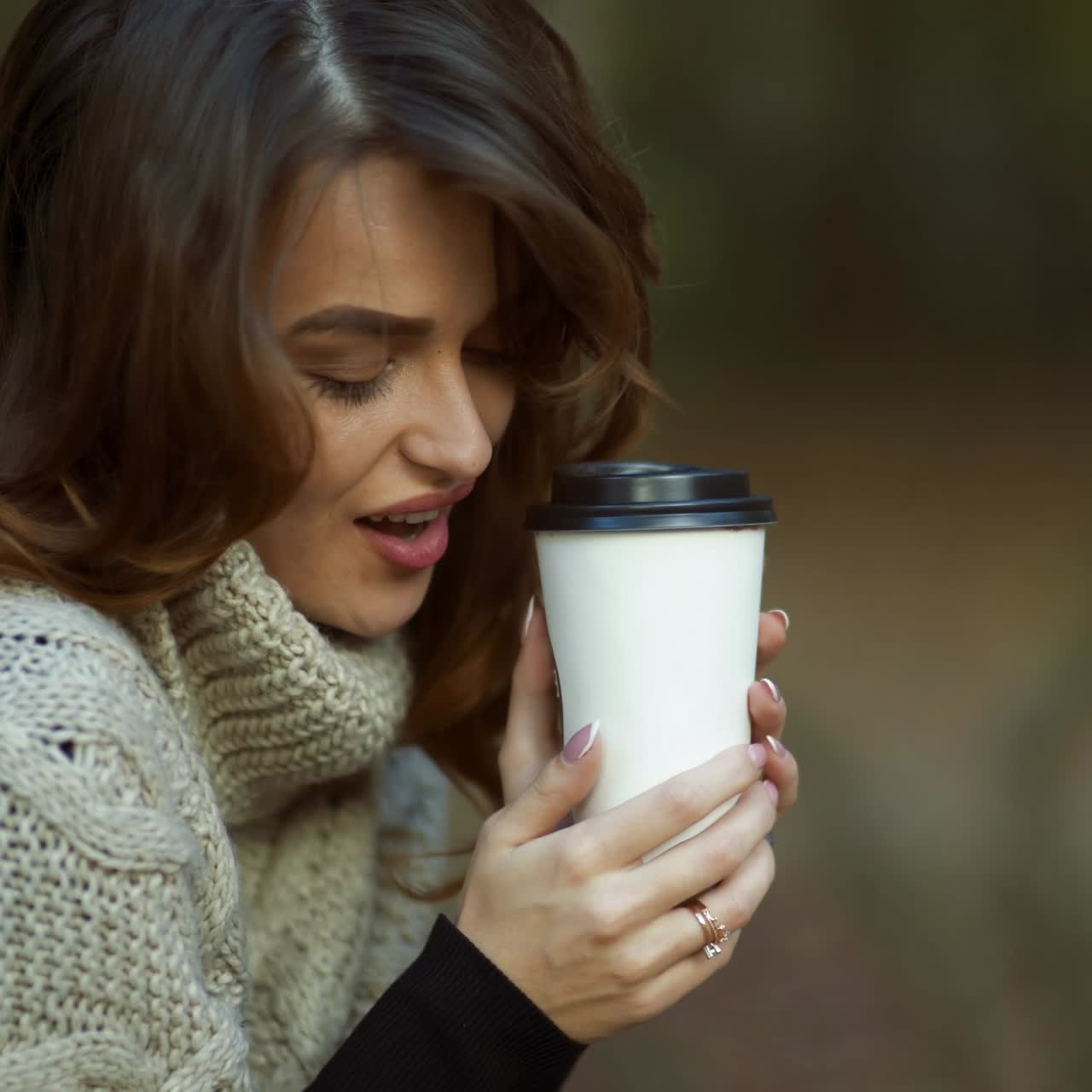 Woman drinking hot tea