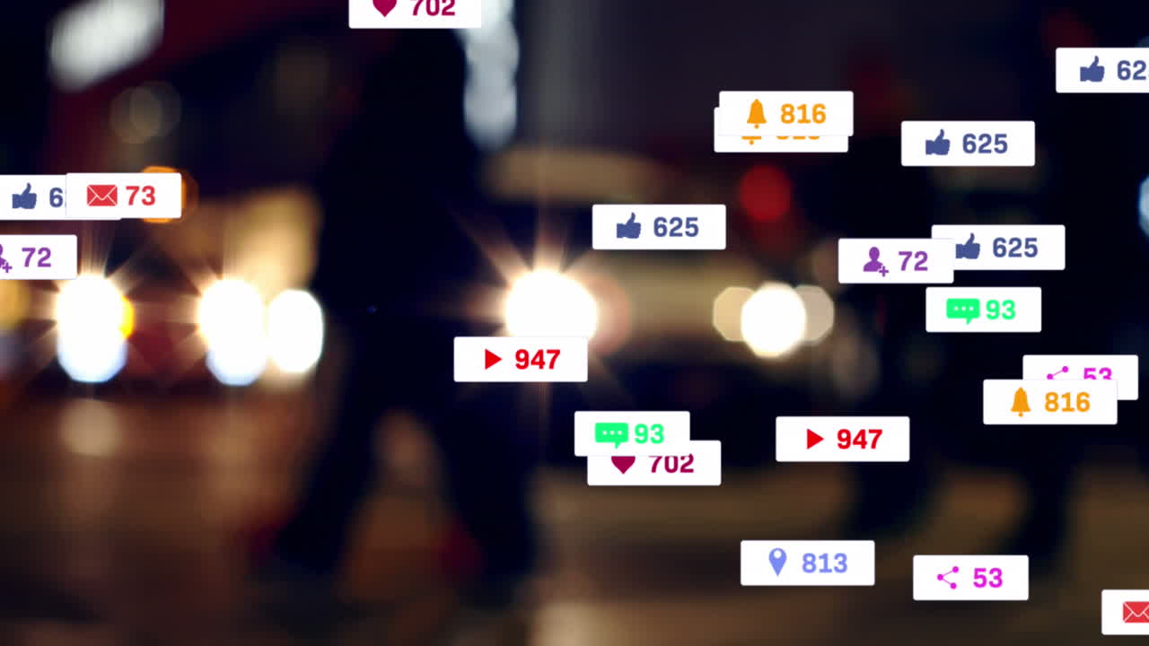 소셜 미디어 아이콘과 숫자의 애니메이션 초점 밖의 도시 및 교통 신호등