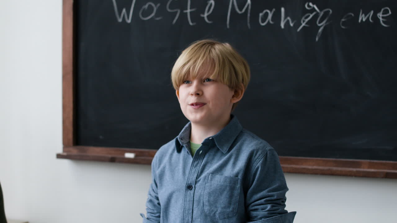 Young boy presenting on waste management