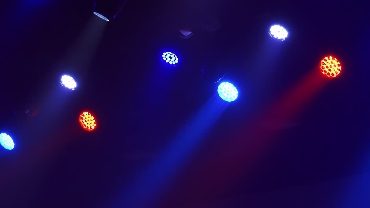 Stage lights move in concert