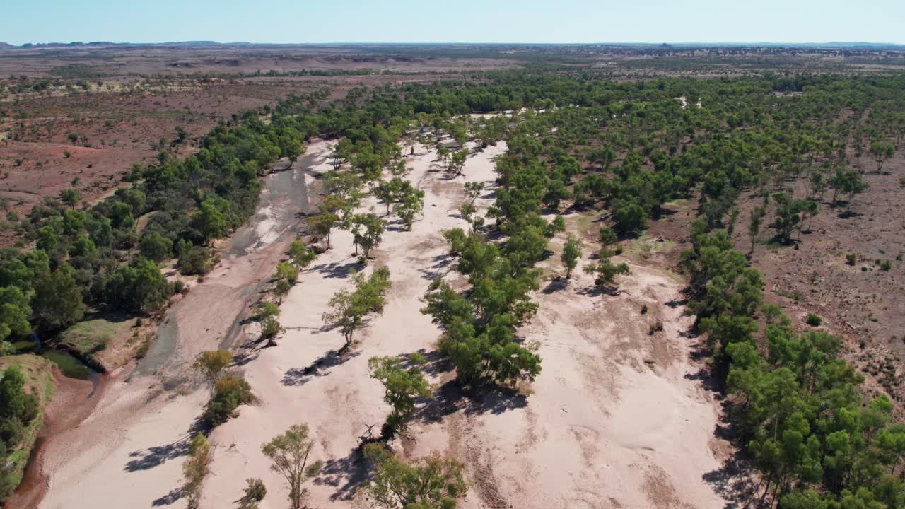Aerial footage of the Finke River near the Stuart Highway in the Northern Territory, Australia. August 2022.