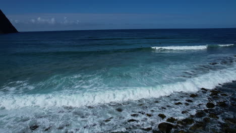 Surfer-surfing-a-wave-in-the-Northernmost-best-surf-spot-at-unstad-in-Lofoten-Norway