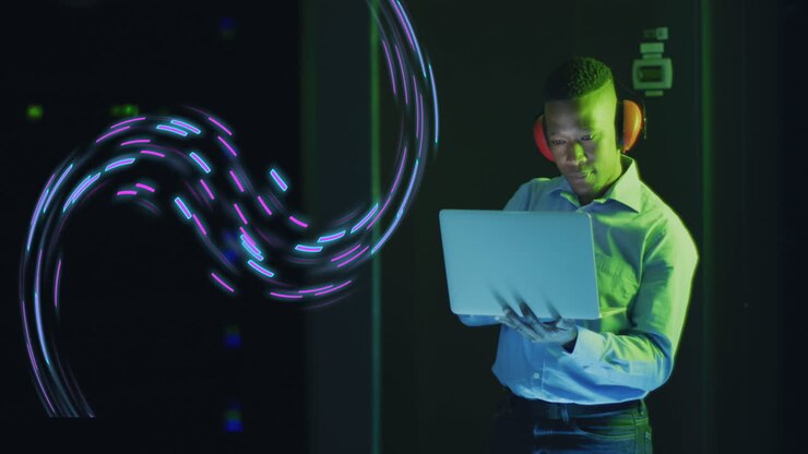 Animation of data processing over african american it technician by computer servers