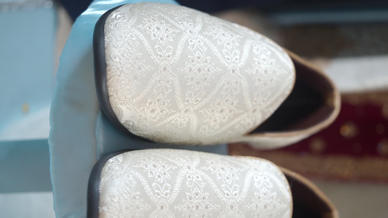 Pair of Elegant White Embroidered Slippers