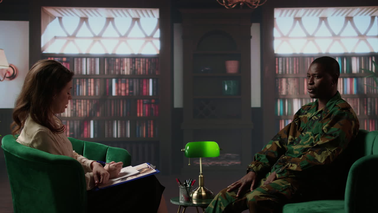 Black combat veteran faces grief and trauma crying at therapy session