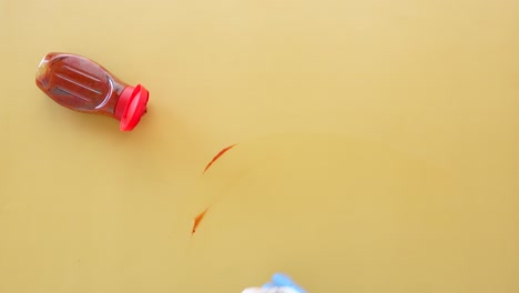 cleaning up a ketchup spill